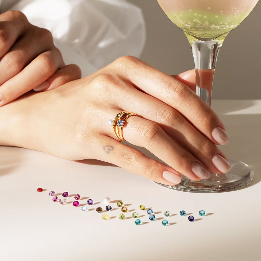 Bar Bizoux rings styled with a cocktail