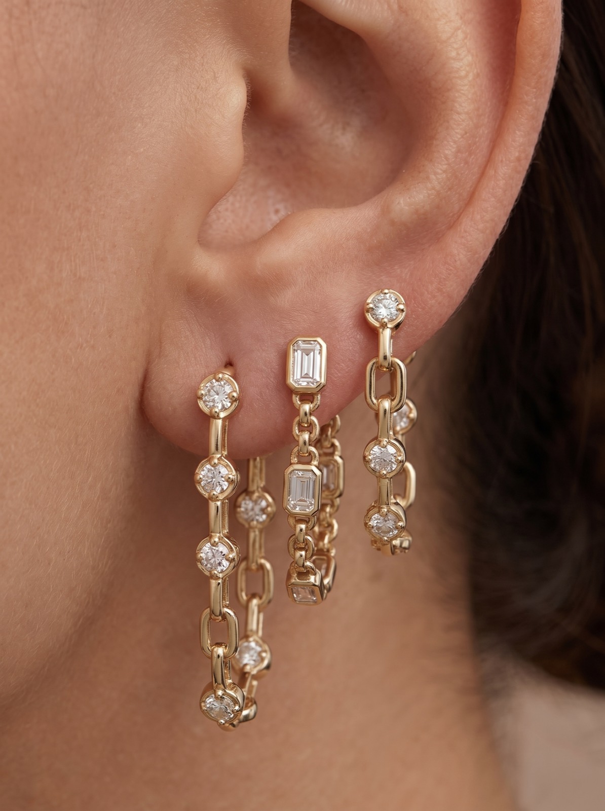 Ear close-up — chain earrings