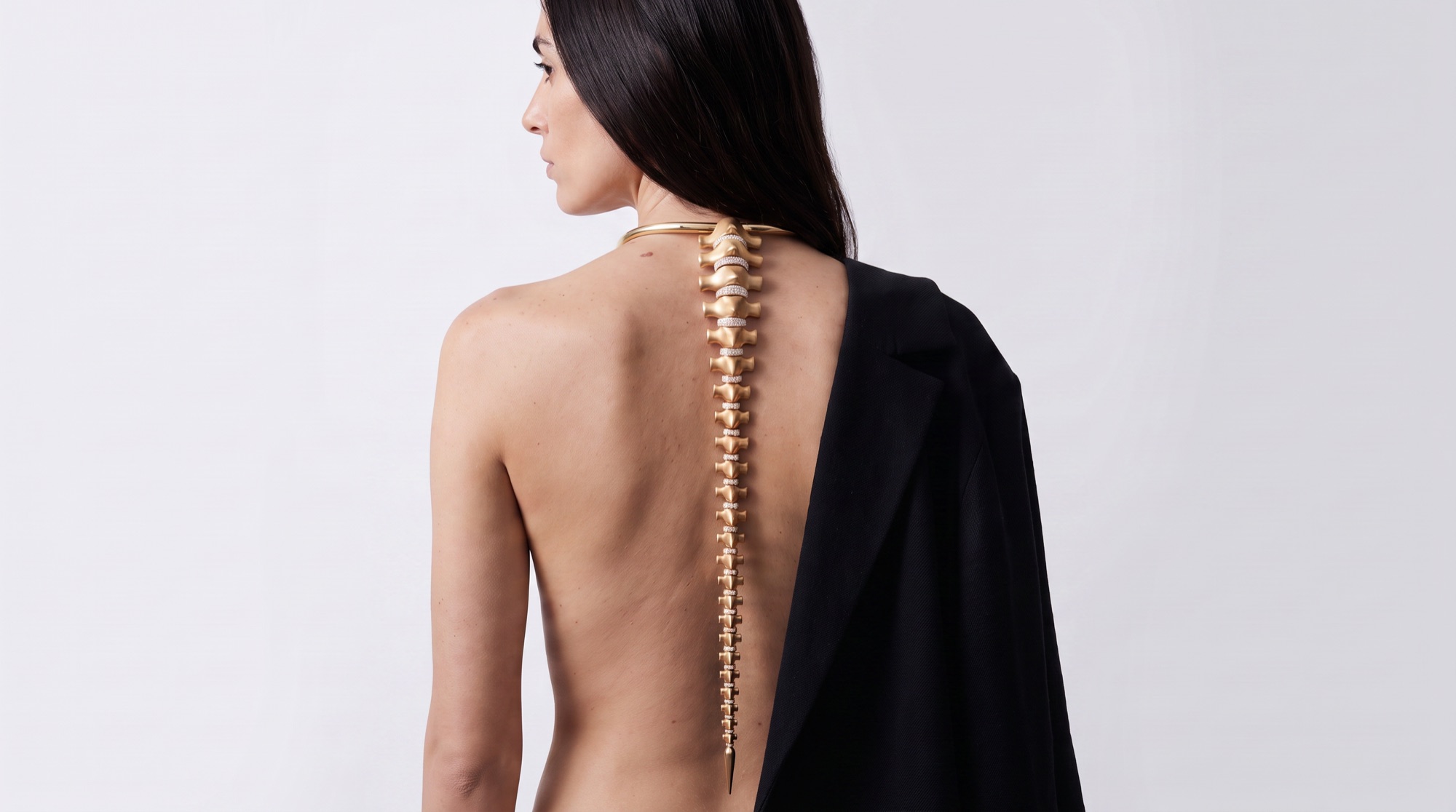 Spine necklace worn down the back